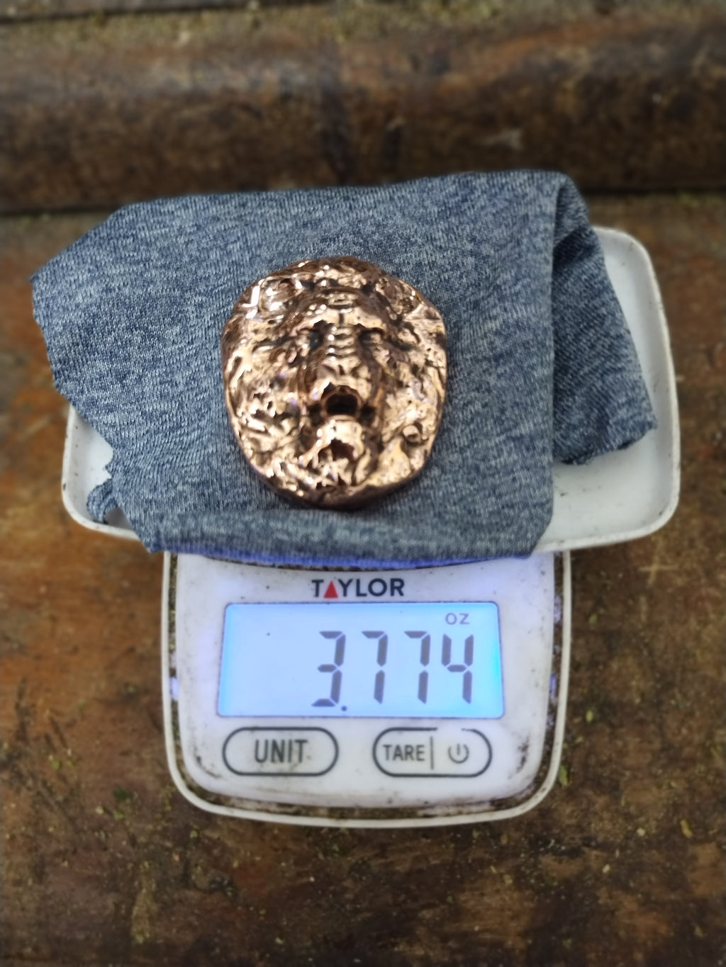 3.7 Ounce Hand Poured and Polished Copper Lion Head Cast